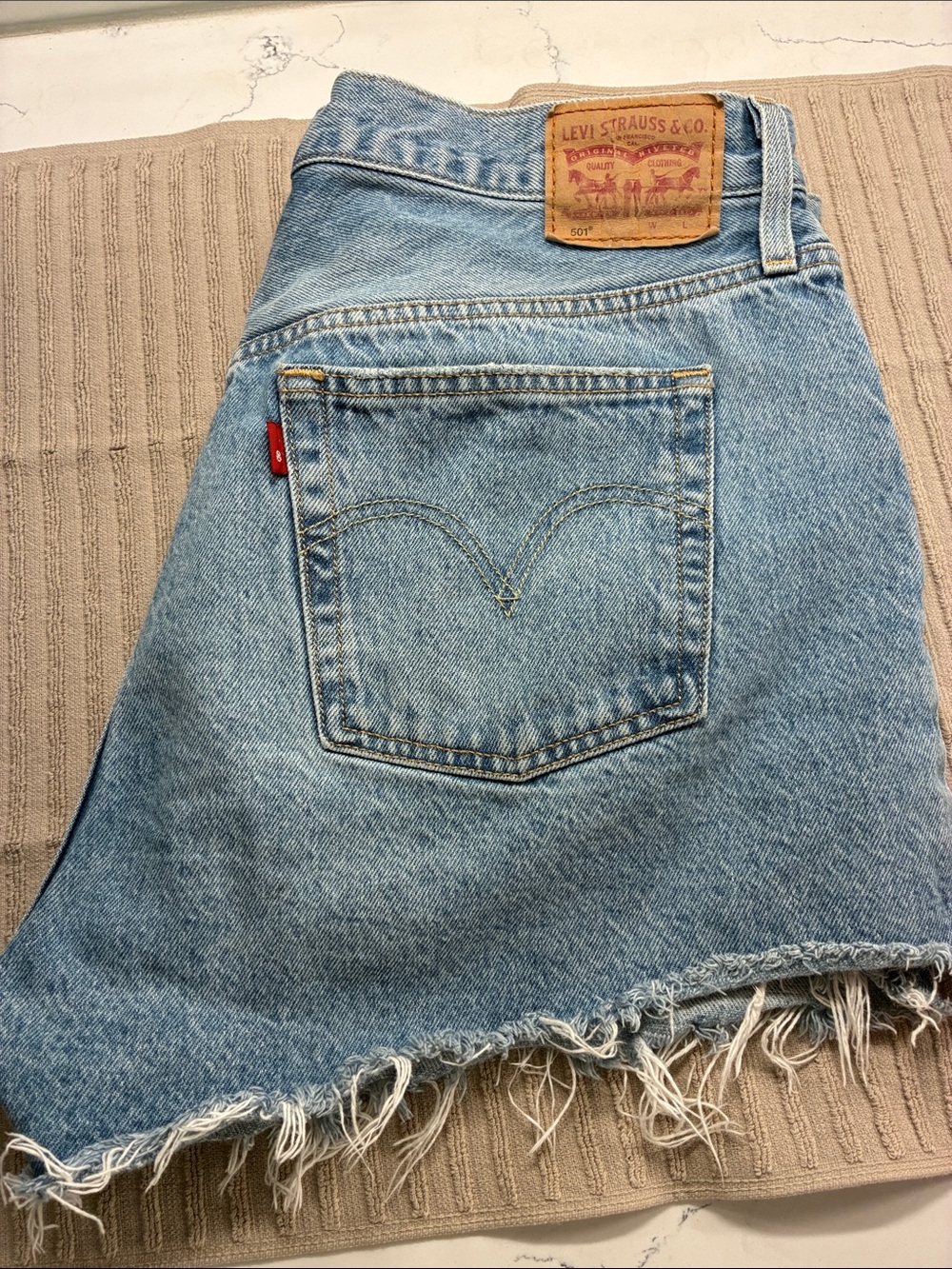 Levi's Light Blue Denim Shorts with Frayed Hem